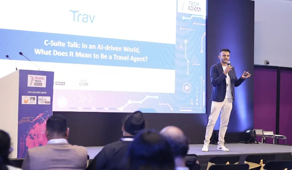A C-suite talk on AI at a travel tech event in Singapore