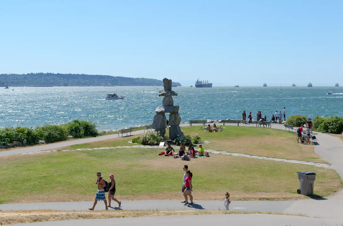 The Inukshuk at English Bay on a sunny day